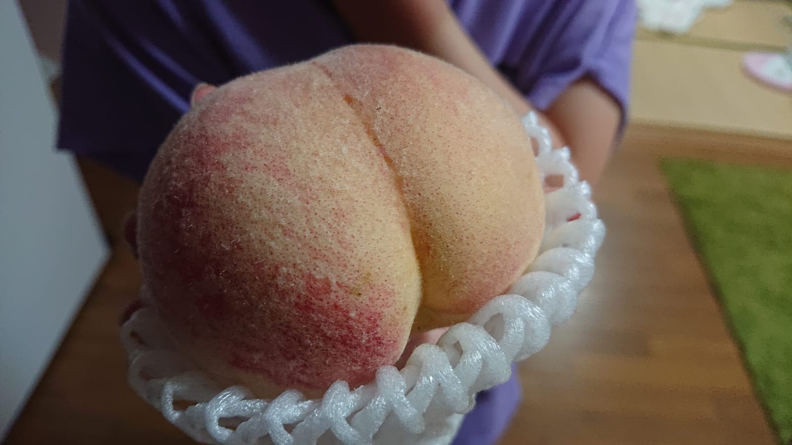 笑って手がふるえるから、うまく撮れない