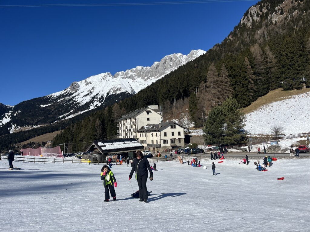 a day of sledding under the blue sky
